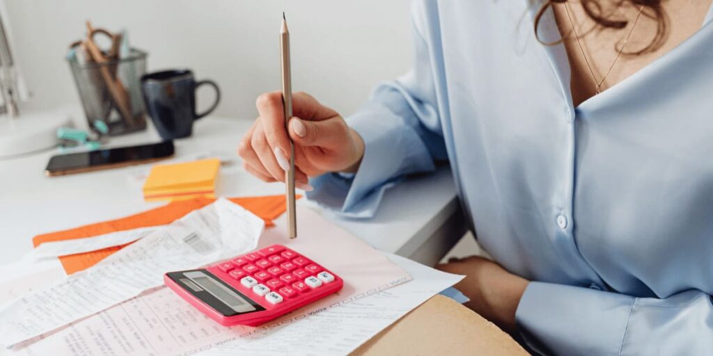 Person Computing her Energy Bills